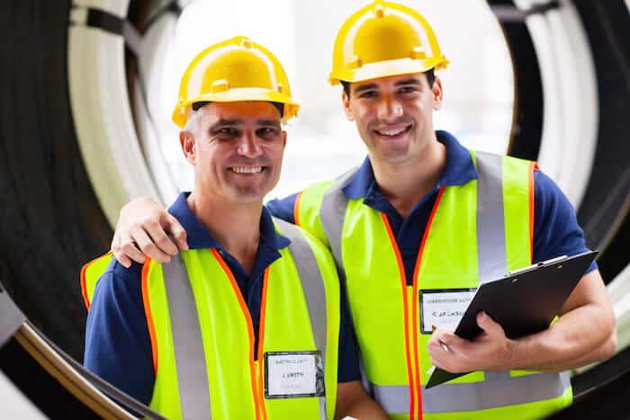 ship crew with high visibility vests