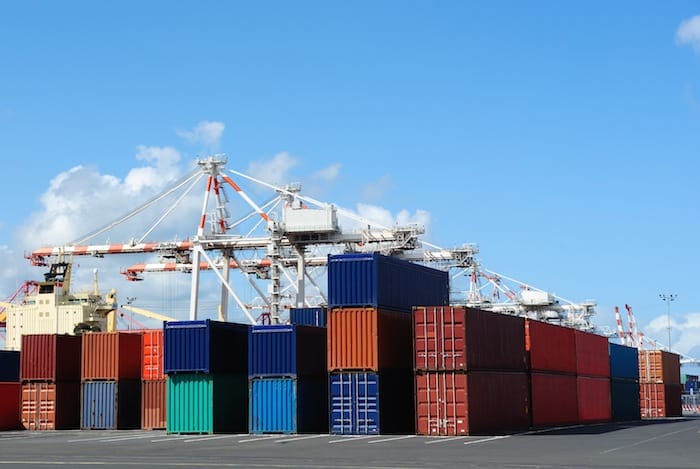 Port cranes and stacks of shipping containers